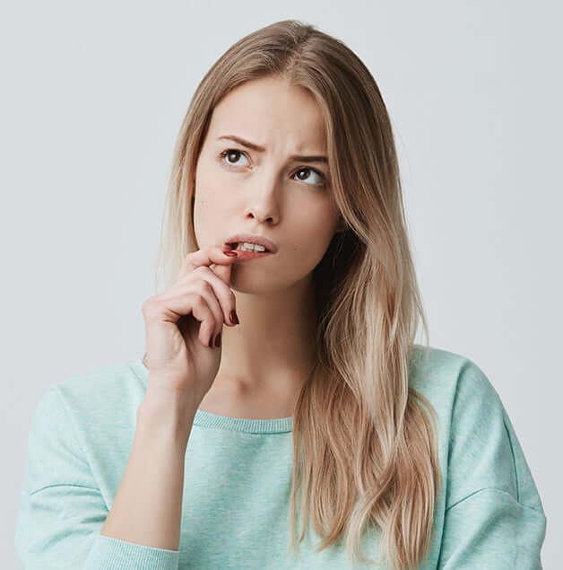 woman looking up in thought