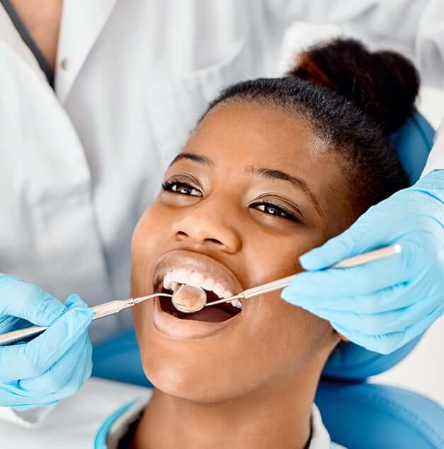 woman receiving a dental exam