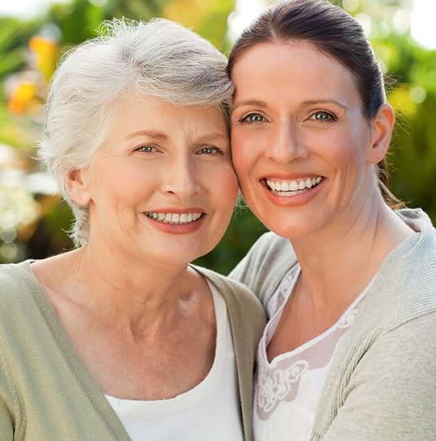 happy mother and her adult daughter