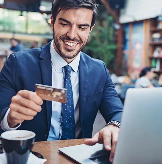 man holding credit card