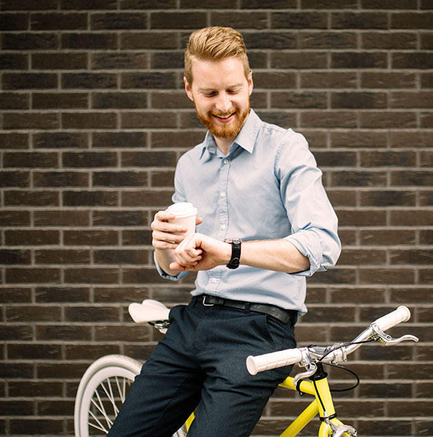 man looking at watch