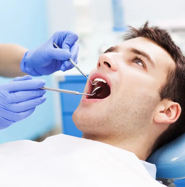 man at the dentist