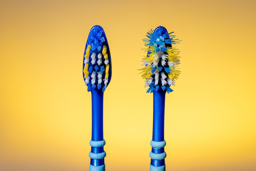 flayed toothbrush after brushing too hard