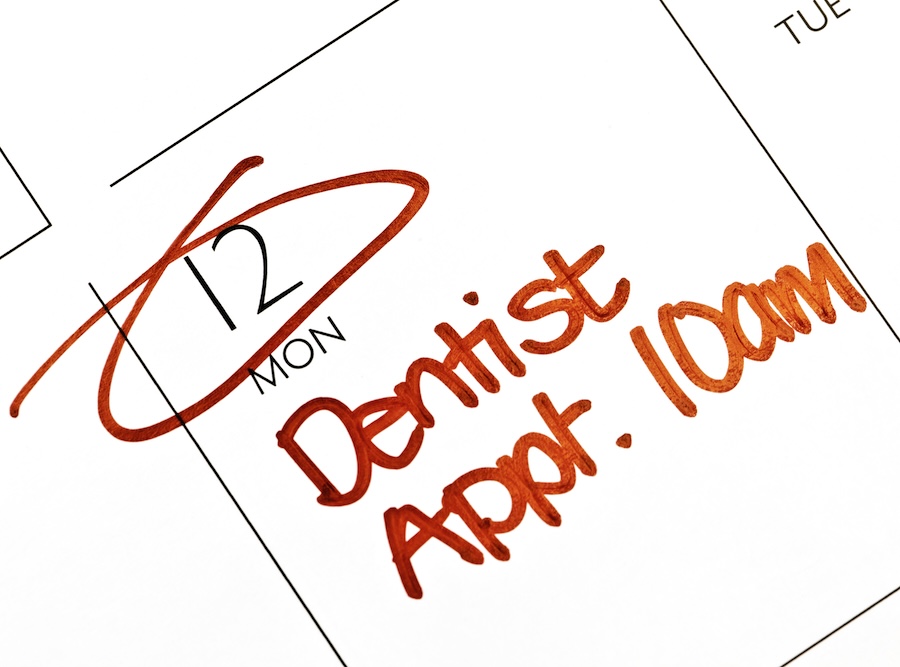 calendar with dental appointment, how often to see the dentist
